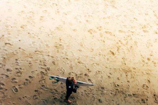 surfer beach  sand  footprints  guy  man  people  surfer