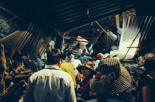 poor people  men  women  crowd  poor  community
