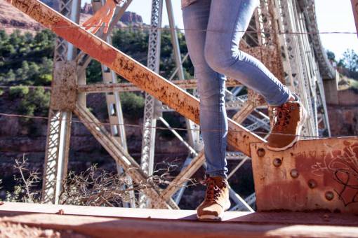 people  woman  lady  fence  steel  bridge  rust