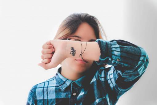 checkered people  woman  tattoo  hand  flannel  eyeglasses  hand
