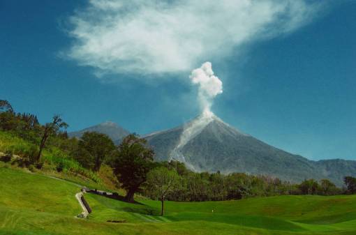 golf voclano  smoke  ash  mountain  golf course  fairway  green
