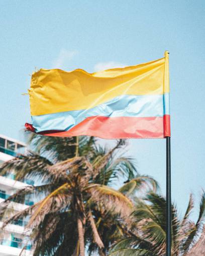 one Flag of Colombia waving outdoors