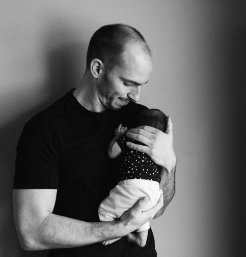 new father holding his baby