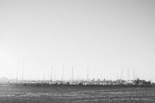 sailboat beach  harbor  harbour  boats  sailboats  black and white
