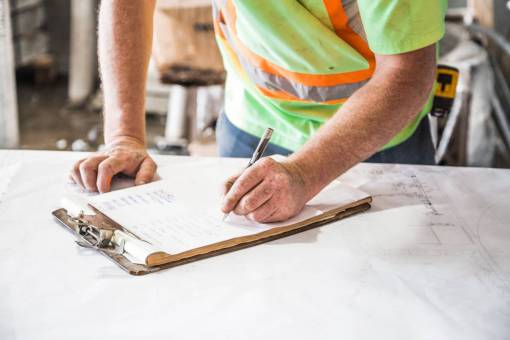 planificacion planos de construcción hombre persona trabajador edificio industrial