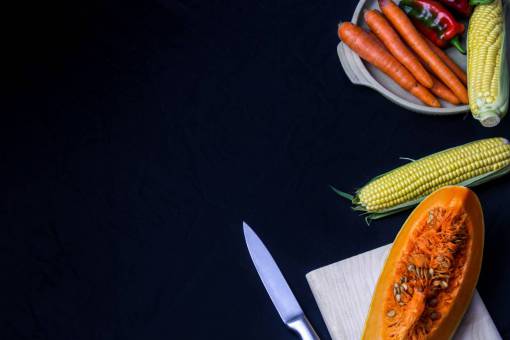 maíz calabaza zanahoria pimiento cuchillo tabla de cortar