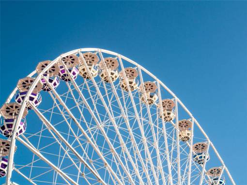 ferris-wheel ferris wheel  blue  sky  amusement park  fair  ride  fun
