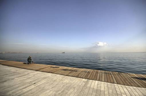 boardwalk fisherman  fishing  boardwalk  wood  dock  water  lake
