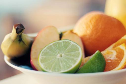 lime fruits  oranges  limes  apples  bananas  bowl
