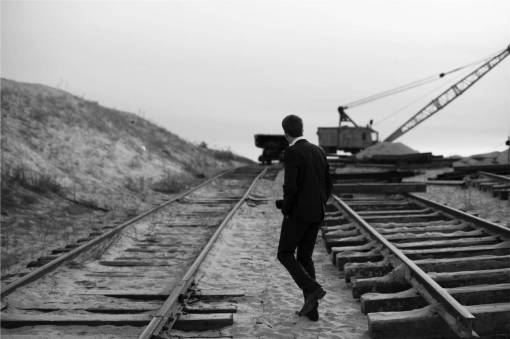 railroad guy  man  suit  railway  railroad  train tracks  sand
