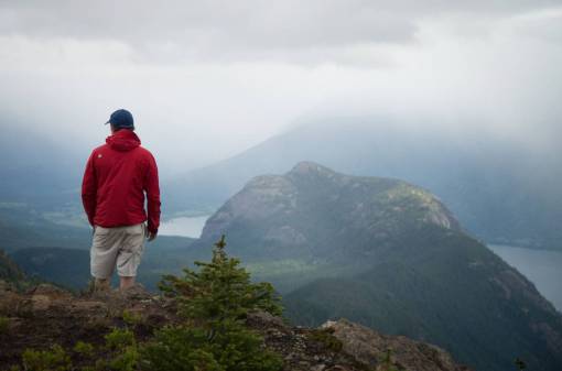 people  man  alone  climbing  mountain  ridge  travel