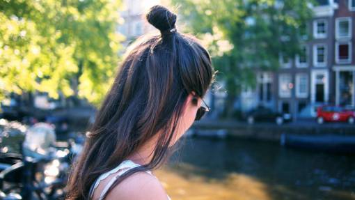 people  woman  bun  green  trees  shades  sunny