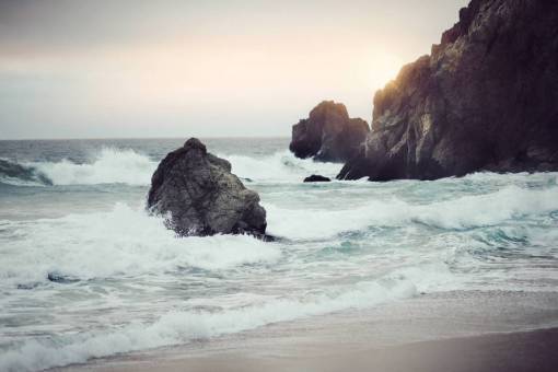 boulders sky  sun  beach  sand  shore  waves  rocks