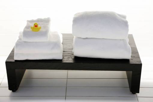 massage spa  white  towels  tiles  bench  yellow  rubber