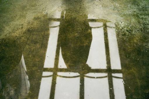 puddle stone  floor  water  puddle  reflection  people
