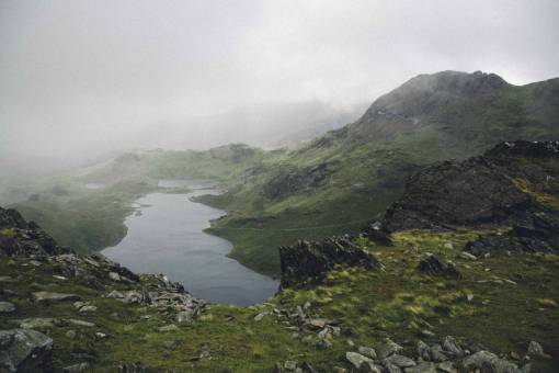water  lake  hill  mountain  green  grass  rocks