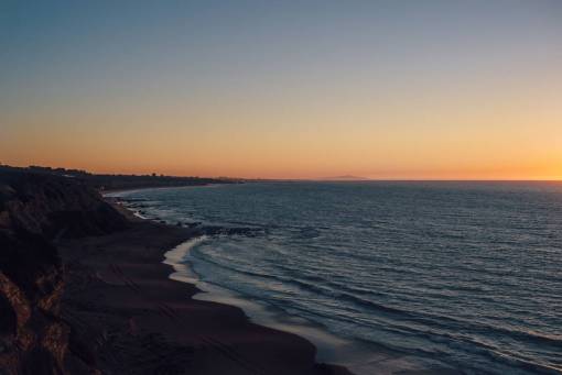 playa arena puesta de sol anochecer cielo océano mar