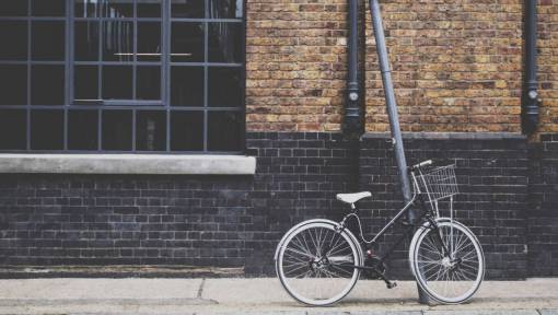 bike  bicycle  basket  bricks  wall  street  building
