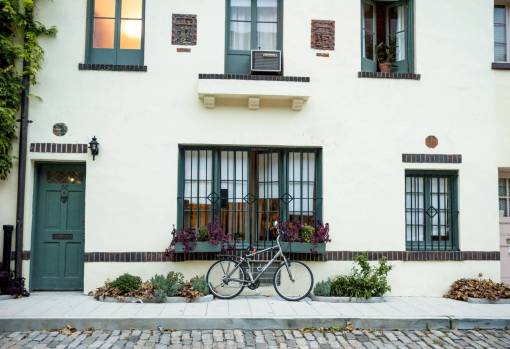 shutter bike  bicycle  building  windows  shutters  sidewalk  street