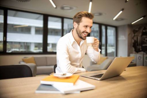 business  man  smiling  coffee  cup  laptop  computer