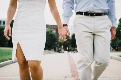 couple  white  holding hands  formal  walking  man  woman