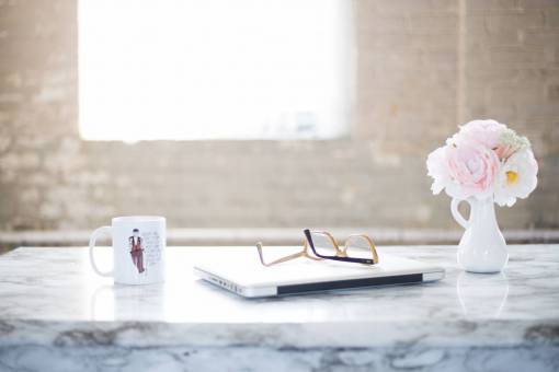 marble-rock desk  flowers  office  laptop  cup  glasses  table