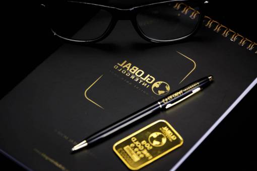 logo notebook  black  pen  eyeglasses  gold  sticker  logo