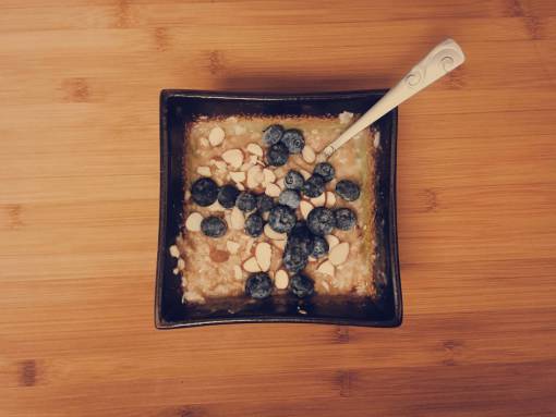 almond oatmeal  blueberries  almonds  breakfast  food  spoon  bowl
