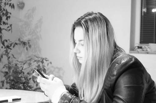 people  woman  blonde  black and white  monochrome  text  cellphone