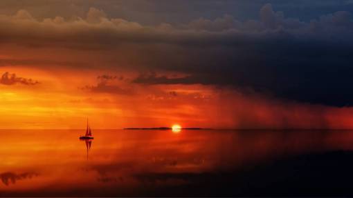 barco océano puesta de sol lluvia nubes reflexión mar
