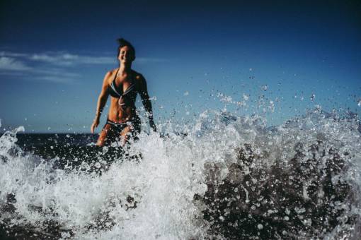 bikini smiling  woman  waves  fun  play  female  girl