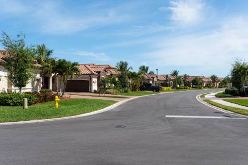daytime suburban  street  houses  road  neighborhood  home  suburb
