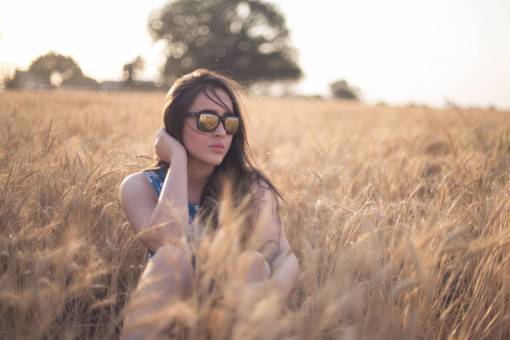 woman  sitting  field  sunglasses  reflection  people  yound