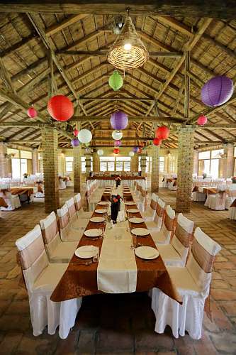 dining interior area chandelier roof ceiling restaurant inside table indoors decoration
