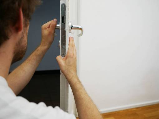 door Man repairing a door