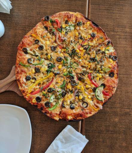 cortar pizza con verduras