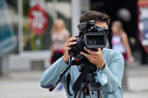 tripod recording photographer filming street camera equipment tripod television estate lens beginners into guide