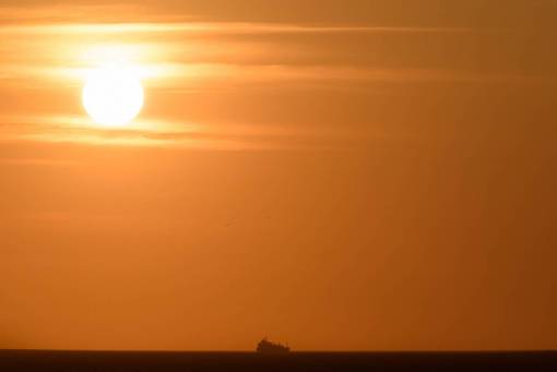 ocean  sunset  ship  sea  boat  warm  golden