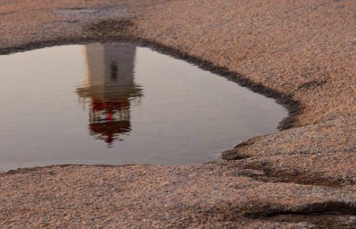 puddle puddle  water  reflection  lighthouse  sky  architecture  coast