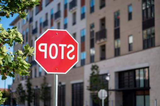 signal stop  sign  city  building  architecture  street  traffic