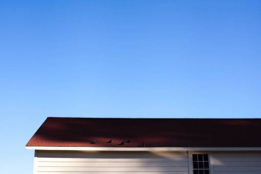 roof-tile aerial  house  building  roof  blue  sky
