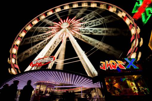 riding ferris wheel  amusement park  ride  fair  fun  entertainment  night