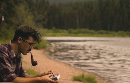 pipe-tube guy  man  pipe  smoking  eyeglasses  river  water