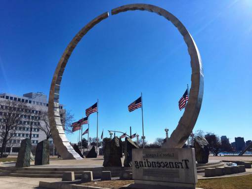arch-architectural-feature landmark  park  arch  town  flag  pole  trees