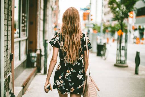 purse walking  city  girl  female  woman  blonde  dress