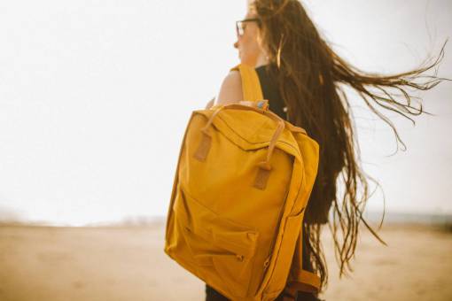 backpacking yellow  backpack  bag  people  girl  woman  travel
