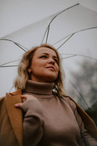 autumn women rain one person woman;umbrella;blonde outdoors caucasian ethnicity