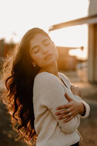 young adult one person adult outdoors latin woman;sunset;close eyes lifestyles women