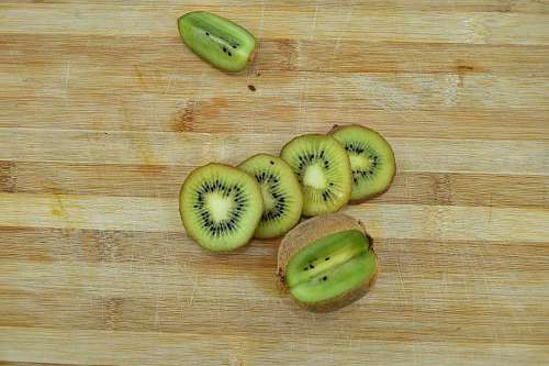 aroma carbohydrate antioxidant fruit dark kiwi slices fresh kitchen table