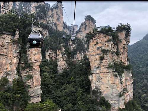 rotation cable conveyance tree rock cliff transport mountains landscape park kb